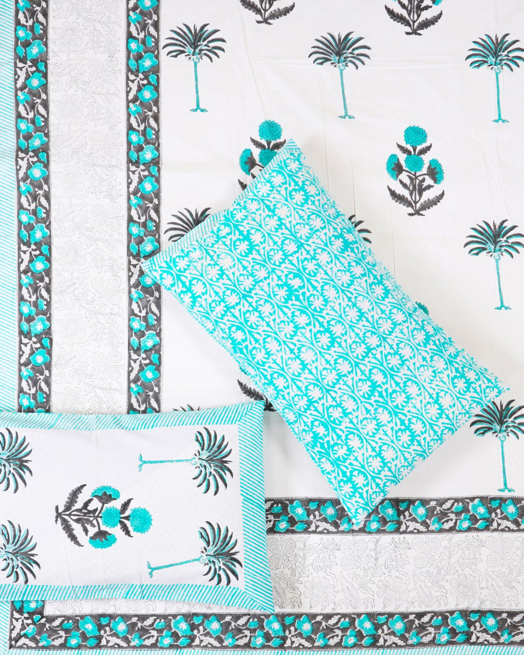 100x108 inch king size cotton bedsheet and matching striped pillow covers styled with a traditional turquoise floral and grey palm tree handblock print.