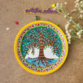 Hand-painted Madhubani terracotta wall plate featuring the Tree of Abundance motif in traditional Mithila art style with a vibrant yellow rim.