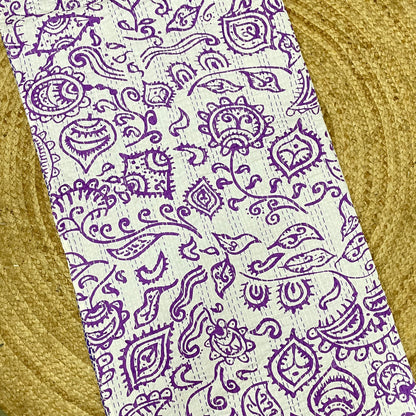 Purple paisley pattern on a white background