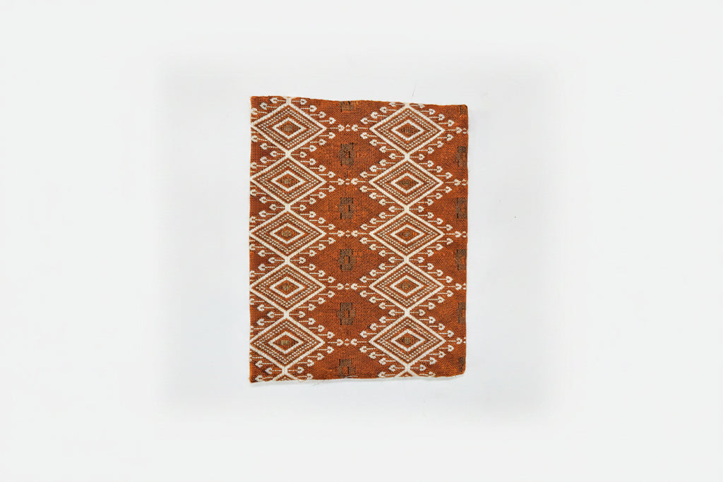 Wildflower Tapestry Jute Cotton Laptop Sleeve featuring botanical woven tapestry fabric and natural jute with purple hand-stitched wave embroidery